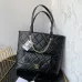 CHANEL Calfskin Quilted Pocket Shopping Tote Black #A49154