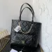 CHANEL Calfskin Quilted Pocket Shopping Tote Black #A49154