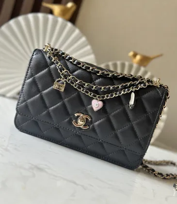 Chanel Quilted Leather Bag With Charm Accents For Unique Luxury Style #A49786