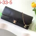 Maxi clutch bag, Grained shiny calfskin &amp; gold-tone metal, black #A49177