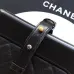 Chanel Women's Bucket Bag - Black &amp; White Quilted Leather, Gold-Tone CC Logo &amp; Two-Tone Chain Strap, Stylish Crossbody Bag for Luxury Fashion #A56750