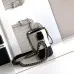 Chanel Women's Bucket Bag - Black &amp; White Quilted Leather, Gold-Tone CC Logo &amp; Two-Tone Chain Strap, Stylish Crossbody Bag for Luxury Fashion #A56750