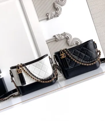 Chanel Women's Bucket Bag - Black &amp; White Quilted Leather, Gold-Tone CC Logo &amp; Two-Tone Chain Strap, Stylish Crossbody Bag for Luxury Fashion #A56750