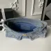 Chanel Women's Denim Tote Bag - Quilted Design, Light Blue Denim Fabric, Gold-Tone CC Logo &amp; Chain Strap with Lock Detail, Spacious Luxury Handbag with Functional Pockets #A56747