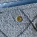 Chanel Women's Denim Tote Bag - Quilted Design, Light Blue Denim Fabric, Gold-Tone CC Logo &amp; Chain Strap with Lock Detail, Spacious Luxury Handbag with Functional Pockets #A56747