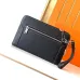 Hermès Leather Zip - Around Wristlet Clutches In Brown And Black With Branded Detailing #A50707