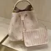 Louis Vuitton Embossed Monogram Bucket Bag With Striped Pouch In Soft Pink #A51589