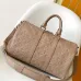 Elegant Beige Louis Vuitton Embossed Leather Speedy Bag For Timeless Luxury Travel And Style #A49952