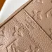 Elegant Beige Louis Vuitton Embossed Leather Speedy Bag For Timeless Luxury Travel And Style #A49952