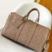 Elegant Beige Louis Vuitton Embossed Leather Speedy Bag For Timeless Luxury Travel And Style #A49952
