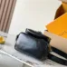 Chic Black Louis Vuitton Bucket Bag With Embossed Strap And Functional Design For Fashionistas #A49796