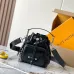 Chic Black Louis Vuitton Bucket Bag With Embossed Strap And Functional Design For Fashionistas #A49796