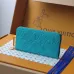 Louis Vuitton Embossed Leather Wallets In Vibrant Colors With Signature Patterns And Charms #A50905