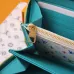 Louis Vuitton Embossed Leather Wallets In Vibrant Colors With Signature Patterns And Charms #A50905