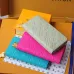 Louis Vuitton Embossed Leather Wallets In Vibrant Colors With Signature Patterns And Charms #A50905