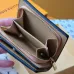Louis Vuitton Beige Leather Wallet With Prominent LV Monogram And Textured Finish #A50895