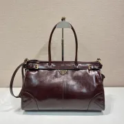 Prada Burgundy Leather Handbag With Signature Logo And Timeless Design #A50984