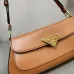Prada Black Leather Triangle Logo Shoulder Bag: A Symbol of Modern Luxury and Style #A49968