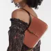 Yves Saint Laurent Green Patent Leather Hobo Bag With Gold Logo And Structured Design #A50817