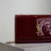 YSL Patent Leather Chain Wallet In Burgundy Showcasing Iconic Logo And Timeless Elegance #A50335