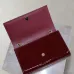 YSL Patent Leather Chain Wallet In Burgundy Showcasing Iconic Logo And Timeless Elegance #A50335