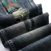 Nostalgic ripped appliqué locomotive men's jeans #99905865