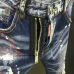 DSQ2 Men's Denim Jeans Edgy Distressed Design with Paint Splatter and Zipper Detail for Fashion Rebels #A54904
