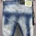DSQ2 Men's Denim Jeans Edgy Distressed Design with Paint Splatter and Zipper Detail for Fashion Rebels #A54906