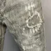 DSQ2 Men's Denim Jeans Edgy Distressed Design with Paint Splatter and Zipper Detail for Fashion Rebels #A54908