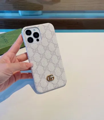 Elegant White Gucci Phone Case With Iconic GG Pattern And Metal Logo For Sophisticated Tech Style #A24451