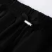 AMIRI Black Sweatpants With Unique Teal Logo For Edgy Streetwear Aesthetic #999928474