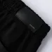 AMIRI Black Sweatpants With Unique Teal Logo For Edgy Streetwear Aesthetic #999928474