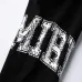 AMIRI Black Sweatpants With Distressed Logo Design For Urban Fashion Lovers #999928475