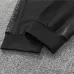 Stylish Black Calvin Klein Tracksuit With Branded Tape Detailing For Modern Athleisure #A30266