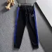 Stylish Loewe Black Tracksuit With Blue And White Stripes And Logo For Trendy Casual Wear #A30148