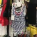 Christian Dior Monogram One - Piece Swimsuits Displayed In Retail Setting For Fashion Seekers #9122044