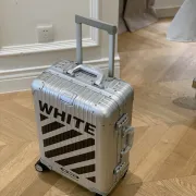 Stylish Silver Off - White Aluminum Luggage With Distinctive Branding For Travel And Fashion #A26261