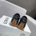 Sleek Black Loewe Sneakers With White Accents And Signature Bow Design For Timeless Style Unisex Shoes #A30334