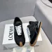 Sleek Black Loewe Sneakers With White Accents And Signature Bow Design For Timeless Style Unisex Shoes #A30334