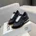 Sleek Black Loewe Sneakers With White Accents And Signature Bow Design For Timeless Style Unisex Shoes #A30334