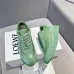 Elegant Sage Green Loewe Sneakers With Gold Accents And Retro Sporty Charm #A30337