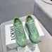 Elegant Sage Green Loewe Sneakers With Gold Accents And Retro Sporty Charm #A30337