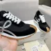 Chic Black Loewe Sneakers With Silver Bow Accents And Luxe Textured Design #A30339