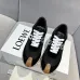 Chic Black Loewe Sneakers With Silver Bow Accents And Luxe Textured Design #A30339