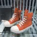 Vibrant Orange Rick Owens DRKSHDW High - Top Boots With White Accents For Bold Style #A26939