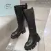 Prada's Stylish Black Lace-Up Knee-High Boots with Chunky Soles on Display #A54585