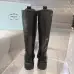 Prada's Stylish Black Lace-Up Knee-High Boots with Chunky Soles on Display #A54585