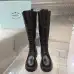 Prada's Stylish Black Lace-Up Knee-High Boots with Chunky Soles on Display #A54585