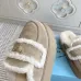 Prada Women's Shearling Lined Mule Slippers Triangle Logo Thick Sole Design for Cozy Luxury Winter Footwear #A57767