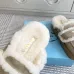 Prada Women's Shearling Lined Mule Slippers Triangle Logo Thick Sole Design for Cozy Luxury Winter Footwear #A57767